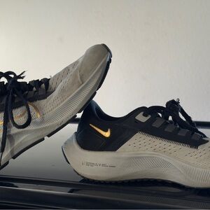 Nike Pegasus 5.5Y Black and Gray Sneakers with Gold Swoosh